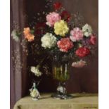 Herbert Davis Richter R.I., R.S.W., R.O.I. (British 1874-1955) Floral still life with a vase of carn