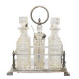 A Victorian silver cruet stand,