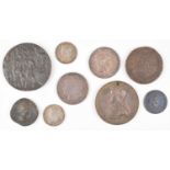 Assortment of historic British and world coins and medals.