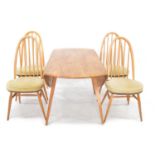 Ercol elm dining table and four chairs