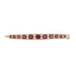 A ruby and diamond hinged bangle,