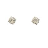 A pair of brilliant cut diamond stud earrings,