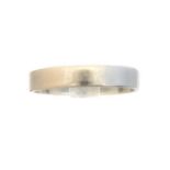 A platinum band ring,