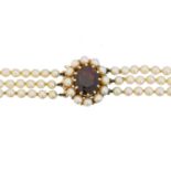 A 9ct gold garnet and cultured pearl necklace,