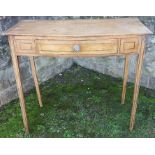 A 19th century, possibly Regency, painted pine bow front side table, with ebonised line inlay,