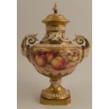 A Royal Worcester covered pedestal vase, decorated all round with hand painted fruit by Freeman,