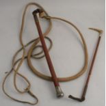 A leather bull whip, with bamboo handle and nickle plated end, together with a child's hunting crop,