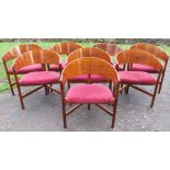 A suite of 20th century rosewood veneered furniture, to include a set of eight dining chairs, with