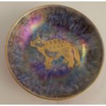 A Wedgwood lustre circular pin tray, decorated with Chinese lion within lambrequin well, on a blue