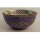 A Wedgwood lustre Imperial bowl, decorated with rain dragons and the sacred pearl with flames, on