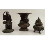 An Oriental bronze covered censer, the cover decorated with mythical animals, the base with flowers,