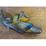 A late 19th century puzzle snuff shoe, with impressed maker's mark, having carved leaf decoration