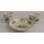 An early 19th century Minton trio, comprising a coffee can, tea cup and saucer, decorated with sepia