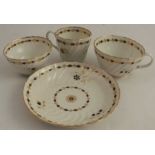 A late 18th century Worcester tea bowl, tea cup, coffee can, and saucer, decorated with flower