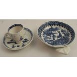 A Caughley miniature blue and white cup and saucer, decorated with pagodas near water and an island,