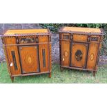 A pair of 18th century continental satinwood lacquer and inlaid breakfront cabinets, with fret