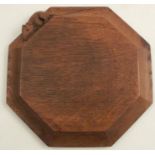 A Robert Thompson Mouseman teapot stand, with carved mouse, diameter 8ins