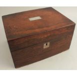 A 19th century rosewood jewellery box, having mother of pearl inlay, with part fitted interior and