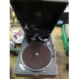 His Masters Voice, a cased portable record player, together with various records