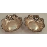 A pair of pierced silver shaped circular dishes, Birmingham 1896, weight 1oz, diameter 4.25ins