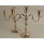 A pair of Elkington & Co silver candelabra, each having three lights and two branches, Birmingham