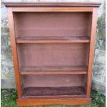 An Edwardian mahogany open front book case, fitted with two adjustable shelves, and having satinwood