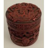 A cinnabar lacquered cylinder covered pot, height 3.25ins - Some minor chips to carving