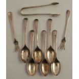 A set of six silver coffee spoons, with matching sugar tongs, with engraved decoration, Sheffield