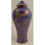 A Wedgwood baluster lustre vase and cover, shape no.23, decorated with flying humming birds and