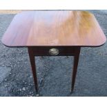 A 19th century mahogany Pembroke table, fitted with a drawers and dummy drawer, raised on square