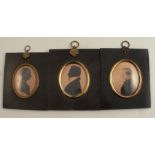 Three 19h century silhouette profiles, two gentleman and a lady, in ebonised frames, two inscribed