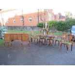 A reproduction walnut dining room suite, comprising a twin pedestal extending dining table, with