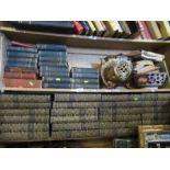 A shelf of encyclopaedias, together with a collection of Dickens, etc.