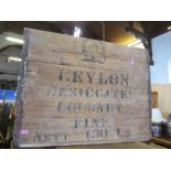 A wooden crate, stamped Ceylon Desiccated Coconut, etc. height 18ins, width 24ins, depth 19ins.