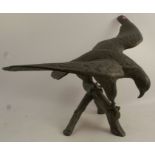 A metal model, of an eagle on a branch, width 27ins x height 17.5ins