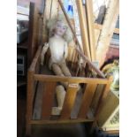 A jointed doll, marked Simon Halbig, af, together with a Triang doll's cot