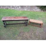 An oak coffee table, width 53ins x depth 16ins x height 19ins, together with a long footstool with