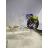 A pair of Dartington wine glasses together with another pair of wine glasses and three glasses