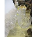 A set of six cut glass wine glasses, together with another glass
