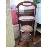 A mahogany cake stand