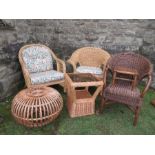 A collection of cane furniture, to include three armchairs, glass top table, and a round table,