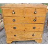 An Antique pine chest, of two short over three long drawers, raised on bracket feet, 36ins x
