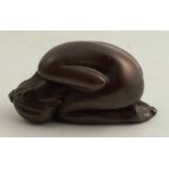 D J Scaldwell, a bronze model of a nude curled up, 1.75ins x 3.25ins