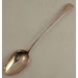 An 18th century silver basting spoon, engraved with a crest, London 1776, weight 3oz, length 11.