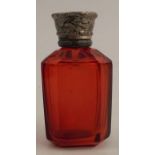 A red glass scent bottle with white metal cap, height 3ins approx