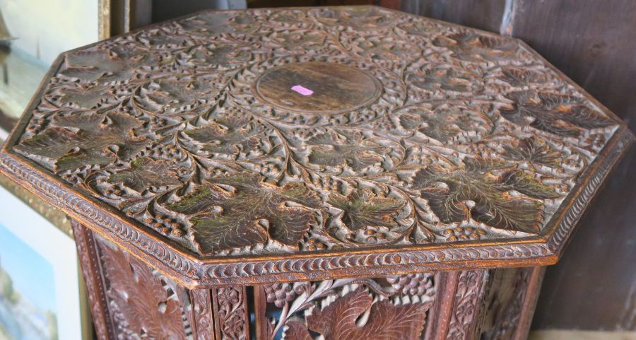 A carved Eastern octagonal table, with folding base, diameter 24ins, height 25ins - Image 4 of 4