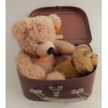 A Steiff plush dog, Cockie, together with a Steiff bear and a Steiff suitcase