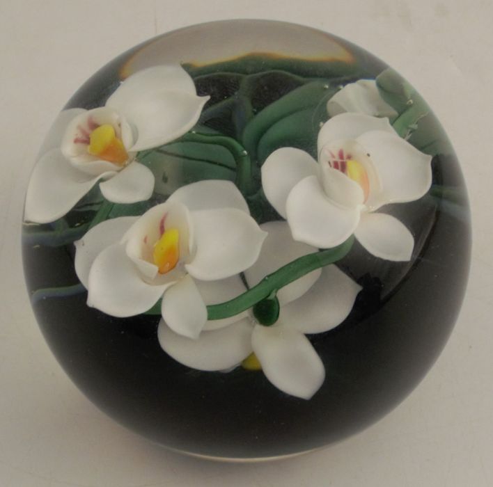 A Lundberg Studios New York, paperweight, with flowers encased, by Daniel Salazar, signed with