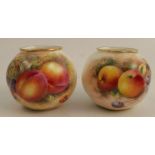 Two Royal Worcester wrythen vases, decorated with half round hand painted fruit by Freeman and