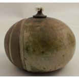 A Wurtz pottery oil lamp, of ovoid form, with wick to the top, height 4ins - Good condition